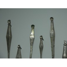 Metal ear picks with a shape resembling a diamond
